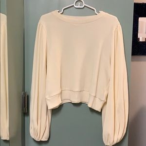 Cream, pleated blouse